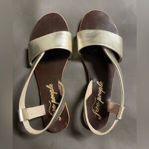 Free People Under Wraps Gold Metallic Flat Summer Sandal Size 38 US 8 Bohemian